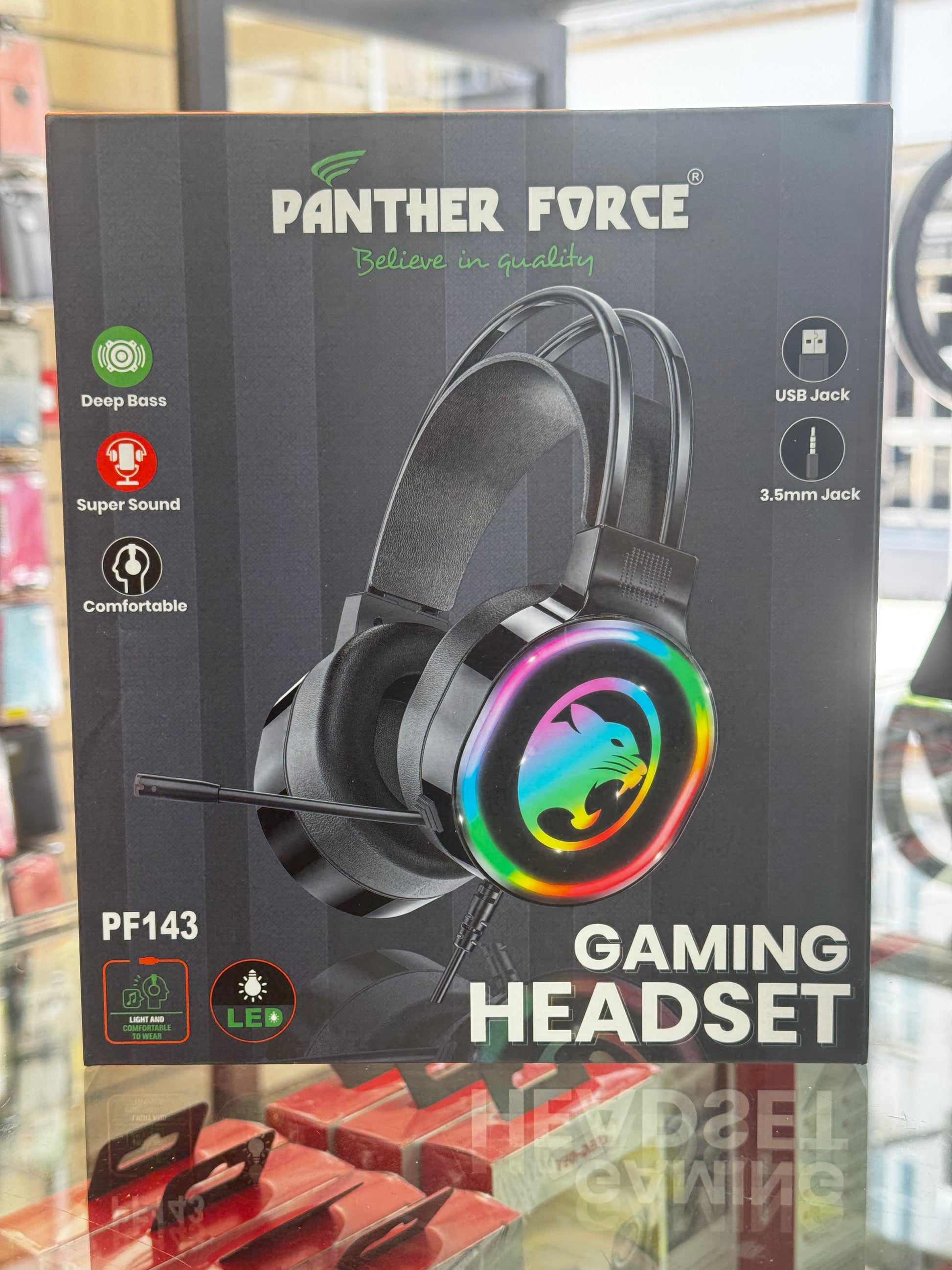 Panther Force gaming headset packaging with RGB light on a blurred background